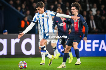 2024-02-14 - Robin LE NORMAND of Real Sociedad and Vitor MACHADO FERREIRA (Vitinha) of PSG during the UEFA Champions League, Round of 16 1st leg football match between Paris Saint-Germain and Real Sociedad on February 14, 2024 at Parc des Princes stadium in Paris, France - FOOTBALL - CHAMPIONS LEAGUE - PARIS SG V REAL SOCIEDAD - UEFA CHAMPIONS LEAGUE - SOCCER