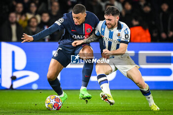 2024-02-14 - Kylian MBAPPE of PSG and Javi GALAN of Real Sociedad during the UEFA Champions League, Round of 16 1st leg football match between Paris Saint-Germain and Real Sociedad on February 14, 2024 at Parc des Princes stadium in Paris, France - FOOTBALL - CHAMPIONS LEAGUE - PARIS SG V REAL SOCIEDAD - UEFA CHAMPIONS LEAGUE - SOCCER