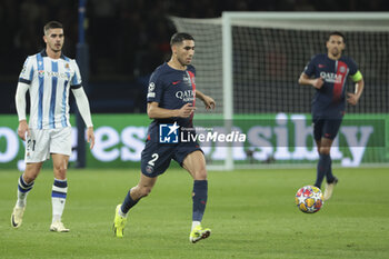 2024-02-14 - Achraf Hakimi of PSG, left Andre Silva of Real Sociedad during the UEFA Champions League, Round of 16 1st leg football match between Paris Saint-Germain (PSG) and Real Sociedad on February 14, 2024 at Parc des Princes stadium in Paris, France - FOOTBALL - CHAMPIONS LEAGUE - PARIS SG V REAL SOCIEDAD - UEFA CHAMPIONS LEAGUE - SOCCER