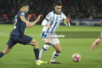 2024-02-14 - Mikel Merino of Real Sociedad, left Achraf Hakimi of PSG during the UEFA Champions League, Round of 16 1st leg football match between Paris Saint-Germain (PSG) and Real Sociedad on February 14, 2024 at Parc des Princes stadium in Paris, France - FOOTBALL - CHAMPIONS LEAGUE - PARIS SG V REAL SOCIEDAD - UEFA CHAMPIONS LEAGUE - SOCCER