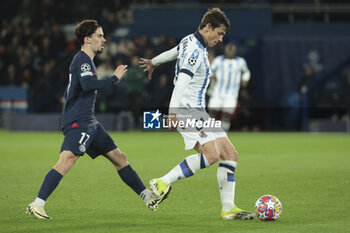 2024-02-14 - Robin Le Normand of Real Sociedad, left Vitinha of PSG during the UEFA Champions League, Round of 16 1st leg football match between Paris Saint-Germain (PSG) and Real Sociedad on February 14, 2024 at Parc des Princes stadium in Paris, France - FOOTBALL - CHAMPIONS LEAGUE - PARIS SG V REAL SOCIEDAD - UEFA CHAMPIONS LEAGUE - SOCCER