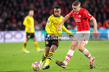 2024-02-20 - Youssoufa Moukoko of Borussia Dortmund, Joey Veerman of PSV during the UEFA Champions League, Round of 16 1st leg football match between PSV and Borussia Dortmund on February 20, 2024 at Philips Stadion in Eindhoven, Netherlands - FOOTBALL - CHAMPIONS LEAGUE - PSV V DORTMUND - UEFA CHAMPIONS LEAGUE - SOCCER