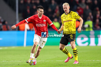 2024-02-20 - Hirving Lozano of PSV, Julian Ryerson of Borussia Dortmund during the UEFA Champions League, Round of 16 1st leg football match between PSV and Borussia Dortmund on February 20, 2024 at Philips Stadion in Eindhoven, Netherlands - FOOTBALL - CHAMPIONS LEAGUE - PSV V DORTMUND - UEFA CHAMPIONS LEAGUE - SOCCER