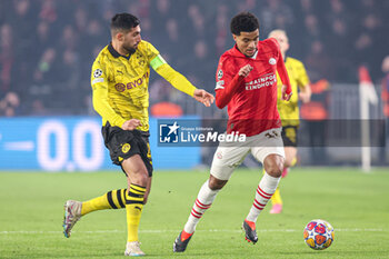 2024-02-20 - Emre Can of Borussia Dortmund, Malik Tillman of PSV during the UEFA Champions League, Round of 16 1st leg football match between PSV and Borussia Dortmund on February 20, 2024 at Philips Stadion in Eindhoven, Netherlands - FOOTBALL - CHAMPIONS LEAGUE - PSV V DORTMUND - UEFA CHAMPIONS LEAGUE - SOCCER