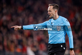 2024-02-20 - Referee Srdjan Jovanovic during the UEFA Champions League, Round of 16 1st leg football match between PSV and Borussia Dortmund on February 20, 2024 at Philips Stadion in Eindhoven, Netherlands - FOOTBALL - CHAMPIONS LEAGUE - PSV V DORTMUND - UEFA CHAMPIONS LEAGUE - SOCCER