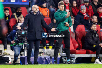 2024-02-20 - Coach Peter Bosz of PSV during the UEFA Champions League, Round of 16 1st leg football match between PSV and Borussia Dortmund on February 20, 2024 at Philips Stadion in Eindhoven, Netherlands - FOOTBALL - CHAMPIONS LEAGUE - PSV V DORTMUND - UEFA CHAMPIONS LEAGUE - SOCCER