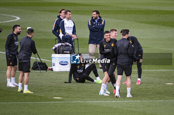 2024-03-05 - Real Madrid players (from L to R) Federico Valverde, Dani Ceballos, Toni Kroos, Nacho Fernandez joke with each other during the training of the day before the second leg of the round of 16 football match of Champions League against RB Leipzig at Ciudad Real Madrid in Valdebebas, Madrid. - REAL MADRID VS RB LEIPZIG: REAL MADRID TRAINING AND PRESS CONFERENCE - UEFA CHAMPIONS LEAGUE - SOCCER