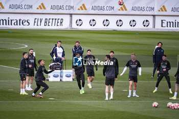 2024-03-05 - Federico Valverde of Real Madrid runs in the middle of his teammates during the training of the day before the second leg of the round of 16 football match of Champions League against RB Leipzig at Ciudad Real Madrid in Valdebebas, Madrid. - REAL MADRID VS RB LEIPZIG: REAL MADRID TRAINING AND PRESS CONFERENCE - UEFA CHAMPIONS LEAGUE - SOCCER