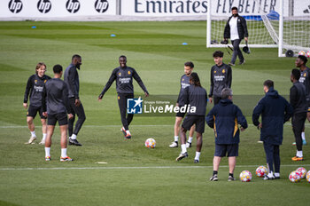 2024-03-05 - Ferland Mendy of Real Madrid runs in the middle of his teammates during the training of the day before the second leg of the round of 16 football match of Champions League against RB Leipzig at Ciudad Real Madrid in Valdebebas, Madrid. - REAL MADRID VS RB LEIPZIG: REAL MADRID TRAINING AND PRESS CONFERENCE - UEFA CHAMPIONS LEAGUE - SOCCER