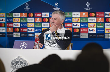 2024-03-05 - Carlo Ancelotti, coach of Real Madrid smiles during the press conference of the day before the second leg of the round of 16 football match of Champions League against RB Leipzig at Ciudad Real Madrid in Valdebebas, Madrid. - REAL MADRID VS RB LEIPZIG: REAL MADRID TRAINING AND PRESS CONFERENCE - UEFA CHAMPIONS LEAGUE - SOCCER