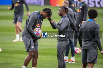 2024-03-05 - Chadaille Bitshiabu (L) and Amadou Haidara (R) of RB Leipzig seen during the training session the day before the second leg of the round of 16 football match of Champions League against Real Madrid at Santiago Bernabeu stadium in Madrid. - REAL MADRID VS RB LEIPZIG: RB LEIPZIG TRAINING AND PRESS CONFERENCE - UEFA CHAMPIONS LEAGUE - SOCCER