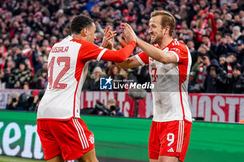 2024-03-05 - Harry Kane of Bayern Munich celebrates his goal 3-0 with Jamal Musiala during the UEFA Champions League, Round of 16, 2nd leg football match between FC Bayern Munich and SS Lazio on March 5, 2024 at Allianz Arena in Munich, Germany - FOOTBALL - CHAMPIONS LEAGUE - BAYERN MUNICH V LAZIO - UEFA CHAMPIONS LEAGUE - SOCCER