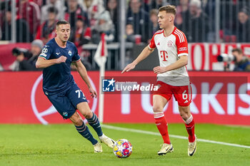 2024-03-05 - Joshua Kimmich of Bayern Munich and Adam Marusic of Lazio during the UEFA Champions League, Round of 16, 2nd leg football match between FC Bayern Munich and SS Lazio on March 5, 2024 at Allianz Arena in Munich, Germany - FOOTBALL - CHAMPIONS LEAGUE - BAYERN MUNICH V LAZIO - UEFA CHAMPIONS LEAGUE - SOCCER