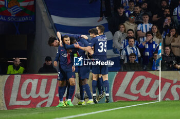 2024-03-05 - Kylian Mbappe of Paris Saint-Germain celebrates his goal 0-1 with his teammates during the UEFA Champions League, Round of 16, 2nd leg football match between Real Sociedad and Paris Saint-Germain on March 5, 2024 at Reale Arena in San Sebastian, Spain - FOOTBALL - CHAMPIONS LEAGUE - REAL SOCIEDAD V PARIS SG - UEFA CHAMPIONS LEAGUE - SOCCER