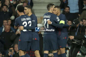 2024-03-05 - Kylian Mbappe of PSG (R) celebrates his second goal with Lucas Hernandez, Achraf Hakimi of PSG during the UEFA Champions League, Round of 16, 2nd leg football match between Real Sociedad and Paris Saint-Germain (PSG) on March 5, 2024 at Reale Arena in San Sebastian, Spain - FOOTBALL - CHAMPIONS LEAGUE - REAL SOCIEDAD V PARIS SG - UEFA CHAMPIONS LEAGUE - SOCCER