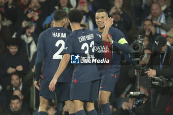 2024-03-05 - Kylian Mbappe of PSG (R) celebrates his second goal with teammates during the UEFA Champions League, Round of 16, 2nd leg football match between Real Sociedad and Paris Saint-Germain (PSG) on March 5, 2024 at Reale Arena in San Sebastian, Spain - FOOTBALL - CHAMPIONS LEAGUE - REAL SOCIEDAD V PARIS SG - UEFA CHAMPIONS LEAGUE - SOCCER