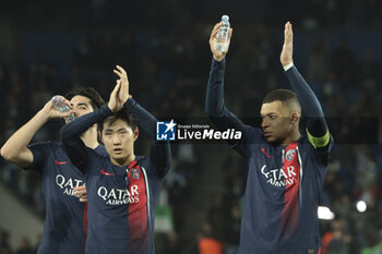 2024-03-05 - Lee Kang-in, Kylian Mbappe of PSG celebrate the victory following the UEFA Champions League, Round of 16, 2nd leg football match between Real Sociedad and Paris Saint-Germain (PSG) on March 5, 2024 at Reale Arena in San Sebastian, Spain - FOOTBALL - CHAMPIONS LEAGUE - REAL SOCIEDAD V PARIS SG - UEFA CHAMPIONS LEAGUE - SOCCER