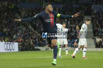 2024-03-05 - Kylian Mbappe of PSG celebrates his first goal during the UEFA Champions League, Round of 16, 2nd leg football match between Real Sociedad and Paris Saint-Germain (PSG) on March 5, 2024 at Reale Arena in San Sebastian, Spain - FOOTBALL - CHAMPIONS LEAGUE - REAL SOCIEDAD V PARIS SG - UEFA CHAMPIONS LEAGUE - SOCCER