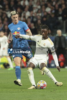 2024-03-06 - Eduardo Camavinga of Real Madrid, left Benjamin Sesko of RB Leipzig during the UEFA Champions League, Round of 16, 2nd leg football match between Real Madrid and RB Leipzig on March 6, 2024 at Santiago Bernabeu stadium in Madrid, Spain - FOOTBALL - CHAMPIONS LEAGUE - REAL MADRID V RB LEIPZIG - UEFA CHAMPIONS LEAGUE - SOCCER