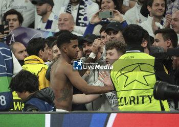 2024-03-06 - Rodrygo of Real Madrid salutes the supporters following the UEFA Champions League, Round of 16, 2nd leg football match between Real Madrid and RB Leipzig on March 6, 2024 at Santiago Bernabeu stadium in Madrid, Spain - FOOTBALL - CHAMPIONS LEAGUE - REAL MADRID V RB LEIPZIG - UEFA CHAMPIONS LEAGUE - SOCCER