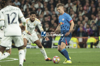 2024-03-06 - Dani Olmo of RB Leipzig, left Jude Bellingham of Real Madrid during the UEFA Champions League, Round of 16, 2nd leg football match between Real Madrid and RB Leipzig on March 6, 2024 at Santiago Bernabeu stadium in Madrid, Spain - FOOTBALL - CHAMPIONS LEAGUE - REAL MADRID V RB LEIPZIG - UEFA CHAMPIONS LEAGUE - SOCCER