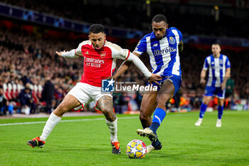2024-03-13 - Gabriel Jesus (9) of Arsenal tussles with Otavio (31) of Porto during the UEFA Champions League, Round of 16, 2nd leg football match between Arsenal and FC Porto on 12 March 2024 at the Emirates Stadium in London, England - FOOTBALL - CHAMPIONS LEAGUE - ARSENAL V PORTO - UEFA CHAMPIONS LEAGUE - SOCCER