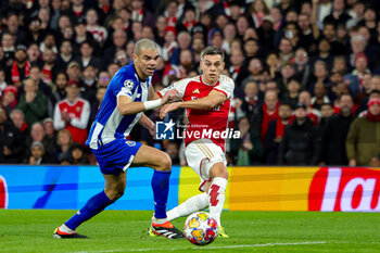 2024-03-13 - Leandro Trossard (19) of Arsenal scores a goal 1-0, Pepe of FC Porto during the UEFA Champions League, Round of 16, 2nd leg football match between Arsenal and FC Porto on 12 March 2024 at the Emirates Stadium in London, England - FOOTBALL - CHAMPIONS LEAGUE - ARSENAL V PORTO - UEFA CHAMPIONS LEAGUE - SOCCER