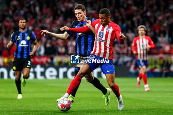 2024-03-13 - Benjamin Pavard of Inter and Samuel Lino of Atletico de Madrid during the UEFA Champions League, Round of 16, 2nd leg football match between Atletico de Madrid and FC Internazionale on March 13, 2024 at Civitas Metropolitano stadium in Madrid, Spain - FOOTBALL - CHAMPIONS LEAGUE - ATLETICO MADRID V INTERNAZIONALE - UEFA CHAMPIONS LEAGUE - SOCCER
