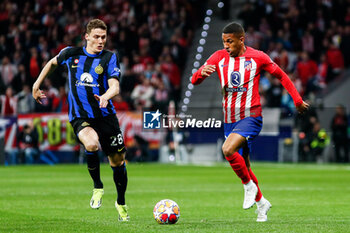 2024-03-13 - Benjamin Pavard of Inter and Samuel Lino of Atletico de Madrid during the UEFA Champions League, Round of 16, 2nd leg football match between Atletico de Madrid and FC Internazionale on March 13, 2024 at Civitas Metropolitano stadium in Madrid, Spain - FOOTBALL - CHAMPIONS LEAGUE - ATLETICO MADRID V INTERNAZIONALE - UEFA CHAMPIONS LEAGUE - SOCCER
