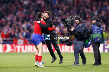 2024-03-13 - Diego Pablo Simeone, head coach of Atletico de Madrid, celebrates the victory with Mario Hermoso at full time during the UEFA Champions League, Round of 16, 2nd leg football match between Atletico de Madrid and FC Internazionale on March 13, 2024 at Civitas Metropolitano stadium in Madrid, Spain - FOOTBALL - CHAMPIONS LEAGUE - ATLETICO MADRID V INTERNAZIONALE - UEFA CHAMPIONS LEAGUE - SOCCER
