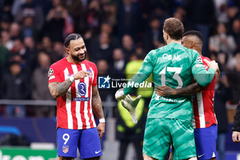 2024-03-13 - Memphis Depay of Atletico de Madrid celebrates the victory with Jan Oblak at full time during the UEFA Champions League, Round of 16, 2nd leg football match between Atletico de Madrid and FC Internazionale on March 13, 2024 at Civitas Metropolitano stadium in Madrid, Spain - FOOTBALL - CHAMPIONS LEAGUE - ATLETICO MADRID V INTERNAZIONALE - UEFA CHAMPIONS LEAGUE - SOCCER