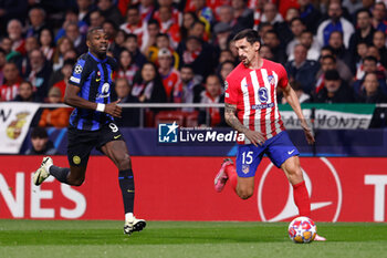 2024-03-13 - Stefan Savic of Atletico de Madrid and Marcus Thuram of Inter during the UEFA Champions League, Round of 16, 2nd leg football match between Atletico de Madrid and FC Internazionale on March 13, 2024 at Civitas Metropolitano stadium in Madrid, Spain - FOOTBALL - CHAMPIONS LEAGUE - ATLETICO MADRID V INTERNAZIONALE - UEFA CHAMPIONS LEAGUE - SOCCER