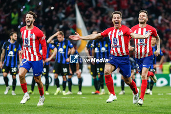 2024-03-13 - Player of Atletico de Madrid celebrate the victory at full time during the UEFA Champions League, Round of 16, 2nd leg football match between Atletico de Madrid and FC Internazionale on March 13, 2024 at Civitas Metropolitano stadium in Madrid, Spain - FOOTBALL - CHAMPIONS LEAGUE - ATLETICO MADRID V INTERNAZIONALE - UEFA CHAMPIONS LEAGUE - SOCCER
