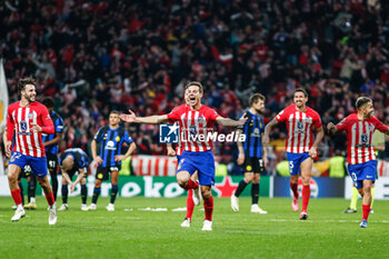 2024-03-13 - Player of Atletico de Madrid celebrate the victory at full time during the UEFA Champions League, Round of 16, 2nd leg football match between Atletico de Madrid and FC Internazionale on March 13, 2024 at Civitas Metropolitano stadium in Madrid, Spain - FOOTBALL - CHAMPIONS LEAGUE - ATLETICO MADRID V INTERNAZIONALE - UEFA CHAMPIONS LEAGUE - SOCCER