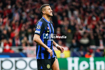 2024-03-13 - Alexis Sanchez of Inter reacts during the penalty shoot-out during the UEFA Champions League, Round of 16, 2nd leg football match between Atletico de Madrid and FC Internazionale on March 13, 2024 at Civitas Metropolitano stadium in Madrid, Spain - FOOTBALL - CHAMPIONS LEAGUE - ATLETICO MADRID V INTERNAZIONALE - UEFA CHAMPIONS LEAGUE - SOCCER