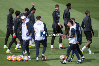 2024-04-08 - Carlo Ancelotti (L), coach of Real Madrid, seen with his collaborators and players during the training of Real Madrid the day before the quarter-final first leg football match of Champions League against Manchester City at Ciudad Real Madrid in Valdebebas, Madrid. - REAL MADRID VS MANCHESTER CITY: REAL MADRID TRAINING AND PRESS CONFERENCE - UEFA CHAMPIONS LEAGUE - SOCCER