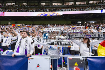 2024-04-09 - Real Madrid fans during the UEFA Champions League quarter-final first leg match between Real Madrid CF and Manchester City at Estadio Santiago Bernabeu on April 9, 2024 in Madrid, Spain. - REAL MADRID VS MANCHESTER CITY - UEFA CHAMPIONS LEAGUE - SOCCER