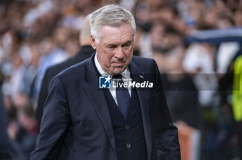 2024-04-09 - Carlo Ancelotti, coach of Real Madrid during the UEFA Champions League quarter-final first leg match between Real Madrid CF and Manchester City at Estadio Santiago Bernabeu on April 9, 2024 in Madrid, Spain. - REAL MADRID VS MANCHESTER CITY - UEFA CHAMPIONS LEAGUE - SOCCER