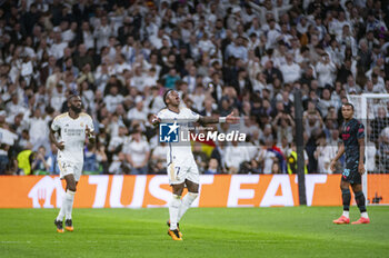 2024-04-09 - Vinicius Junior of Real Madrid celebrates his goal during the UEFA Champions League quarter-final first leg match between Real Madrid CF and Manchester City at Estadio Santiago Bernabeu on April 9, 2024 in Madrid, Spain. - REAL MADRID VS MANCHESTER CITY - UEFA CHAMPIONS LEAGUE - SOCCER