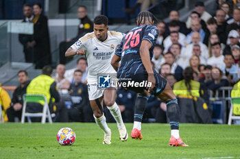 2024-04-09 - Rodrygo Silva de Goes of Real Madrid in action with the ball during the UEFA Champions League quarter-final first leg match between Real Madrid CF and Manchester City at Estadio Santiago Bernabeu on April 9, 2024 in Madrid, Spain. - REAL MADRID VS MANCHESTER CITY - UEFA CHAMPIONS LEAGUE - SOCCER