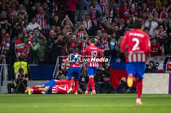 2024-04-10 - Atletico Madrid players seen celebrating the goal of Samuel Lino of Atletico Madrid during the UEFA Champions League quarter-final first leg match between Atletico Madrid and Borussia Dortmund at Estadio Civitas Metropolitano on April 10, 2024 in Madrid, Spain. - ATLETICO MADRID VS BORUSSIA DORTMUND - UEFA CHAMPIONS LEAGUE - SOCCER