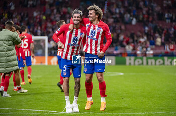 2024-04-10 - Rodrigo De Paul (L) and Antoine Griezmann (R) of Atletico Madrid seen greetings the fans at the end of the UEFA Champions League quarter-final first leg match between Atletico Madrid and Borussia Dortmund at Estadio Civitas Metropolitano on April 10, 2024 in Madrid, Spain. - ATLETICO MADRID VS BORUSSIA DORTMUND - UEFA CHAMPIONS LEAGUE - SOCCER