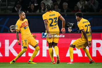 2024-04-10 - Raphael DIAS BELLOLI (Raphinha) of Barcelona celebrate his goal with Jules KOUNDE of Barcelona and Lamine YAMAL of Barcelona during the UEFA Champions League, Quarter-finals, 1st leg football match between Paris Saint-Germain and FC Barcelona on April 10, 2024 at Parc des Princes stadium in Paris, France - FOOTBALL - CHAMPIONS LEAGUE - PARIS SG V FC BARCELONA - UEFA CHAMPIONS LEAGUE - SOCCER