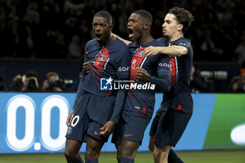 2024-04-10 - Ousmane Dembele of PSG celebrates his goal with Nuno Mendes, Vitinha of PSG during the UEFA Champions League, Quarter-finals, 1st leg football match between Paris Saint-Germain (PSG) and FC Barcelona on April 10, 2024 at Parc des Princes stadium in Paris, France - FOOTBALL - CHAMPIONS LEAGUE - PARIS SG V FC BARCELONA - UEFA CHAMPIONS LEAGUE - SOCCER
