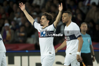 2024-04-16 - Vitinha of PSG celebrates his goal with Kylian Mbappe during the UEFA Champions League, Quarter-finals, 2nd leg football match between FC Barcelona and Paris Saint-Germain (PSG) on April 16, 2024 at Estadi Olímpic Lluís Companys in Barcelona, Spain - FOOTBALL - CHAMPIONS LEAGUE - FC BARCELONA V PARIS SG - UEFA CHAMPIONS LEAGUE - SOCCER