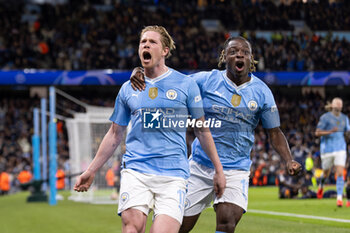 2024-04-17 - Manchester City midfielder Kevin De Bruyne (17) scores and celebrates 1-1 with Jérémy Doku during the UEFA Champions League, Quarter-finals, 2nd leg football match between Manchester City and Real Madrid on April 17, 2024 at Etihad Stadium in Manchester, England - FOOTBALL - CHAMPIONS LEAGUE - MANCHESTER CITY V REAL MADRID - UEFA CHAMPIONS LEAGUE - SOCCER