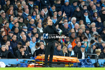 2024-04-17 - Manchester City manager Pep Guardiola during the UEFA Champions League, Quarter-finals, 2nd leg football match between Manchester City and Real Madrid on April 17, 2024 at Etihad Stadium in Manchester, England - FOOTBALL - CHAMPIONS LEAGUE - MANCHESTER CITY V REAL MADRID - UEFA CHAMPIONS LEAGUE - SOCCER