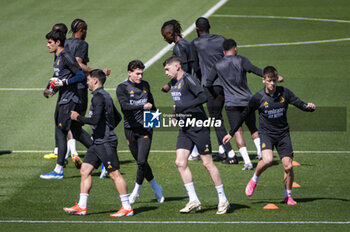 2024-05-07 - MADRID, SPAIN - MAY 7: Federico Valverde of Real Madrid (C) warms up with his teammates during Real Madrid Training Session and Press Conference ahead of their UEFA Champions League semi-final second leg match against FC Bayern Munchen at Ciudad Real Madrid on May 7, 2024 in Valdebebas, Spain. - REAL MADRID VS BAYERN MUNICH: REAL MADRID PRESS CONFERENCE AND TRAINING SESSION - UEFA CHAMPIONS LEAGUE - SOCCER