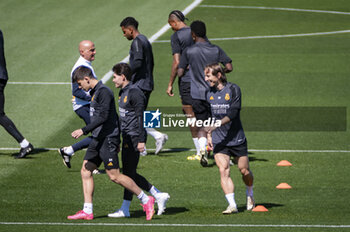 2024-05-07 - MADRID, SPAIN - MAY 7: Luka Modric of Real Madrid (R) warms up with his teammates during Real Madrid Training Session and Press Conference ahead of their UEFA Champions League semi-final second leg match against FC Bayern Munchen at Ciudad Real Madrid on May 7, 2024 in Valdebebas, Spain. - REAL MADRID VS BAYERN MUNICH: REAL MADRID PRESS CONFERENCE AND TRAINING SESSION - UEFA CHAMPIONS LEAGUE - SOCCER