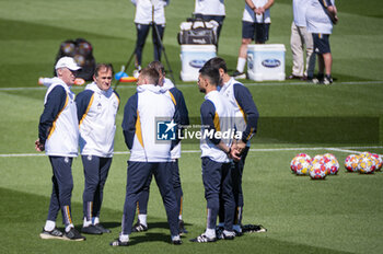 2024-05-07 - MADRID, SPAIN - MAY 7: Carlo Ancelotti, coach of Real Madrid with his collaborators seen during Real Madrid Training Session and Press Conference ahead of their UEFA Champions League semi-final second leg match against FC Bayern Munchen at Ciudad Real Madrid on May 7, 2024 in Valdebebas, Spain. - REAL MADRID VS BAYERN MUNICH: REAL MADRID PRESS CONFERENCE AND TRAINING SESSION - UEFA CHAMPIONS LEAGUE - SOCCER
